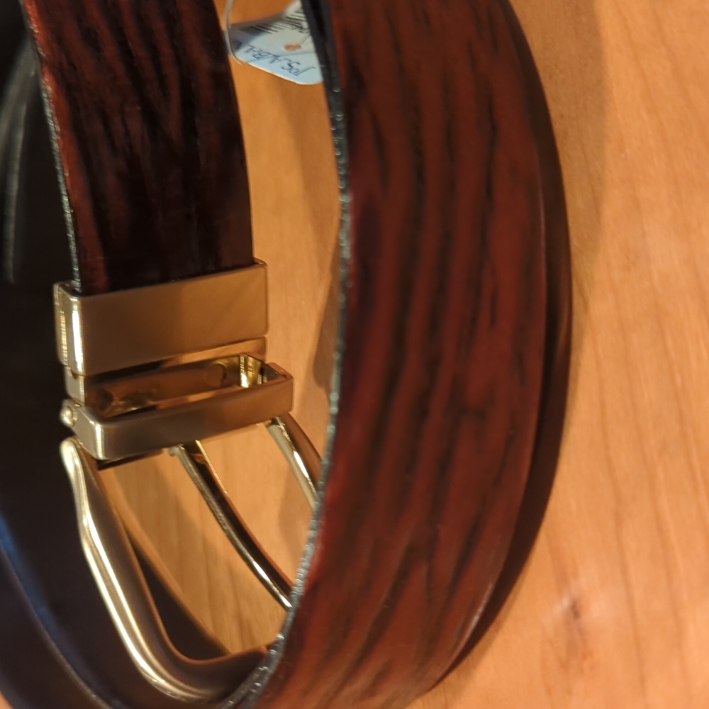 Beautiful Brown and black reversible Jos A Bank belt with silver buckle size 46